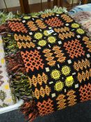 Black ground multi-coloured geometric patterned Welsh blanket