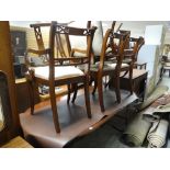 Reproduction extending oval mahogany effect dining table and chairs