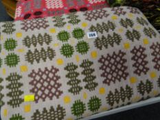 Mushroom ground multi-coloured geometric patterned Welsh blanket