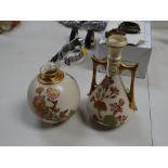 Two Royal Worcester floral decorated ivory ground vases