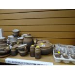 Quantity of Denby stoneware dinnerware including cutlery