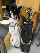 Quantity of modern golf clubs in a lady's and gent's golf bag