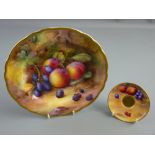 A ROYAL WORCESTER FRUIT PAINTED CABINET PLATE by Horace Price, 22.75 cms diameter, gilt bordered