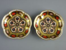 TWO ROYAL CROWN DERBY '1128 IMARI' PIN DISHES with raised lobed edges, 11.5 cms diameter