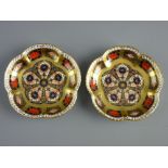 TWO ROYAL CROWN DERBY '1128 IMARI' PIN DISHES with raised lobed edges, 11.5 cms diameter