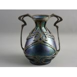 A ZSOLNAY IRIDESCENT POTTERY VASE WITH PEWTER MOUNTS, the bulbous form vase in green and purple