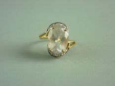 A NINE CARAT GOLD OVAL ROSE QUARTZ DRESS RING, 5 grms gross