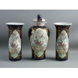 AN ORIENTAL THREE PIECE GARNITURE SET of pair of chimney vases and centre baluster vase with knopped