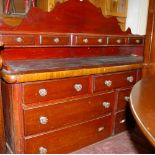 A SUBSTANTIAL VICTORIAN MAHOGANY KITCHEN DRESSER having a shaped and arched back with breakfront