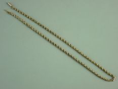 A NINE CARAT GOLD LINK NECK CHAIN with barrel clasp (defective), 6.7 grms