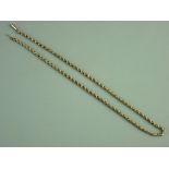 A NINE CARAT GOLD LINK NECK CHAIN with barrel clasp (defective), 6.7 grms