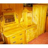 TWO STRIPPED PINE EDWARDIAN DRESSING TABLES, a single door wardrobe and a later bedside cabinet