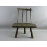 AN 18th CENTURY SPINDLEBACKED CHILD'S SIMPLE CHAIR on three turned supports