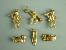 A NINE CARAT GOLD SHOE CHARM, 1.9 grms, two duck charms (unmarked, believed gold) 6 grms, a