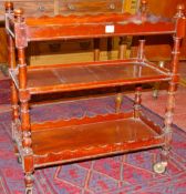 AN OBLONG TOPPED THREE TIER MAHOGANY WHATNOT, 65 cms high
