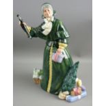 A ROYAL DOULTON FIGURINE - 'Christmas Parcels' HN2851