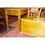 AN OBLONG TOPPED PINE TABLE on square tapered corner supports and a lidded pine blanket chest