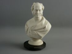 A WHITE PARIAN HEAD & SHOULDERS BUST of an elegant gent, 22 cms high, on a shallow wood plinth.