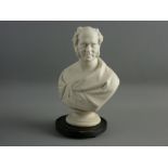 A WHITE PARIAN HEAD & SHOULDERS BUST of an elegant gent, 22 cms high, on a shallow wood plinth.