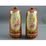 A PAIR OF CRIMSON GROUND ROYAL BONN VASES, slightly tapered with narrow necks, heavily decorated