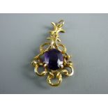 A BELIEVED NINE CARAT GOLD LINK TYPE PENDANT with oval amethyst, approximately 9 x 7 mm, 3 grms