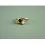 A LADY'S FIFTEEN CARAT GOLD AMETHYST & PEARL CROSSOVER RING, size 'M/N', 3.4 grms gross