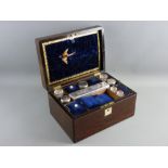 A VICTORIAN ROSEWOOD TRAVELLING VANITY CASE with inset top mother of pearl plaque and escutcheon,