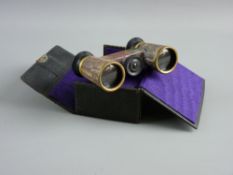A PAIR OF CASED OPERA GLASSES, the body of faux agate bakelite-like material (lid of case delicate)