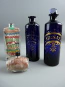 A PAIR OF BRISTOL BLUE GLASS CHIMNEY SHAPED 'NITRIC ACID' JARS, (one stopper missing and chip to