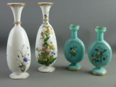 TWO PAIRS OF VICTORIAN OPAQUE GLASS HAND PAINTED VASES including a pair of green moon flask shape