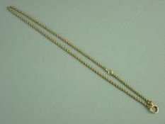 A NINE CARAT GOLD TWIST NECK CHAIN, 12.5 grms