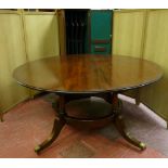 ARTHUR BRETT & SONS, NORWICH, A FINE CIRCULAR CUBAN MAHOGANY DINING TABLE made by this Company and