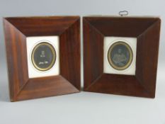 A PAIR OF DAGUERREOTYPE PHOTOGRAPHIC PORTRAITS in gilt oval mounts and wide mahogany frames, 19.75 x