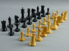 A VICTORIAN JAQUES & SON STAUNTON PATTERN CHESS SET in weighted boxwood and ebony, the 3.5 ins Kings