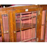 AN EDWARDIAN ROSEWOOD & STRING INLAID HANGING CORNER CUPBOARD having a single central door with nine