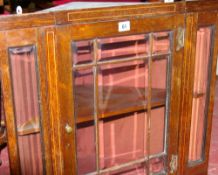 AN EDWARDIAN ROSEWOOD & STRING INLAID HANGING CORNER CUPBOARD having a single central door with nine