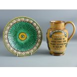 A VICTORIAN DOULTON LAMBETH 'GENERAL GORDON' JUG and a Wedgwood Majolica circular plate, the 19