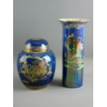 A CARLTONWARE BLUE GROUND ORIENTAL PATTERNED GINGER JAR & LID, the body depicting pagodas, flowers