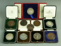 TEN GROCERY & ALLIED TRADES INTERNATIONAL EXHIBITION MEDALS (nine cased), six being silver, majority