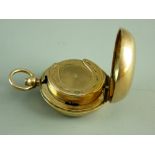 A NINE CARAT GOLD PLAIN CASED SOVEREIGN HOLDER, the inside coin grip in the form of a horseshoe,