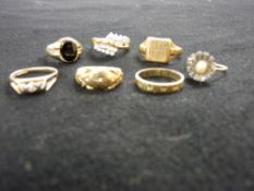 Seven, nine carat gold rings, 19 grms