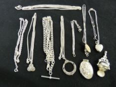 Good parcel of silver lockets, an Albert chain and a triple locket swivel pendant, 100 grms gross