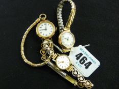 Nice Edwardian gold encased lady's wristwatch with barrel link bracelet, 18.5 grms gross and two