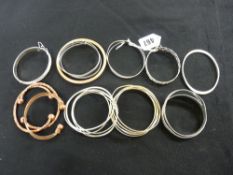 Large parcel of mixed metal bangles
