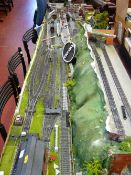 Fine sized model railway layout with platforms, outbuildings etc
