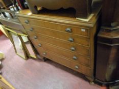 Polished chest of five drawers by Handcraft