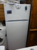 Clean approx 4ft high fridge freezer E/T