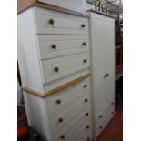 An excellent modern four-piece bedroom suite of two-door wardrobe with lower drawers & three various