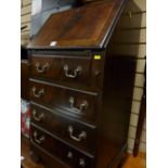 A reproduction mahogany ladies' bureau