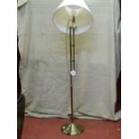 A brass effect standard lamp E/T